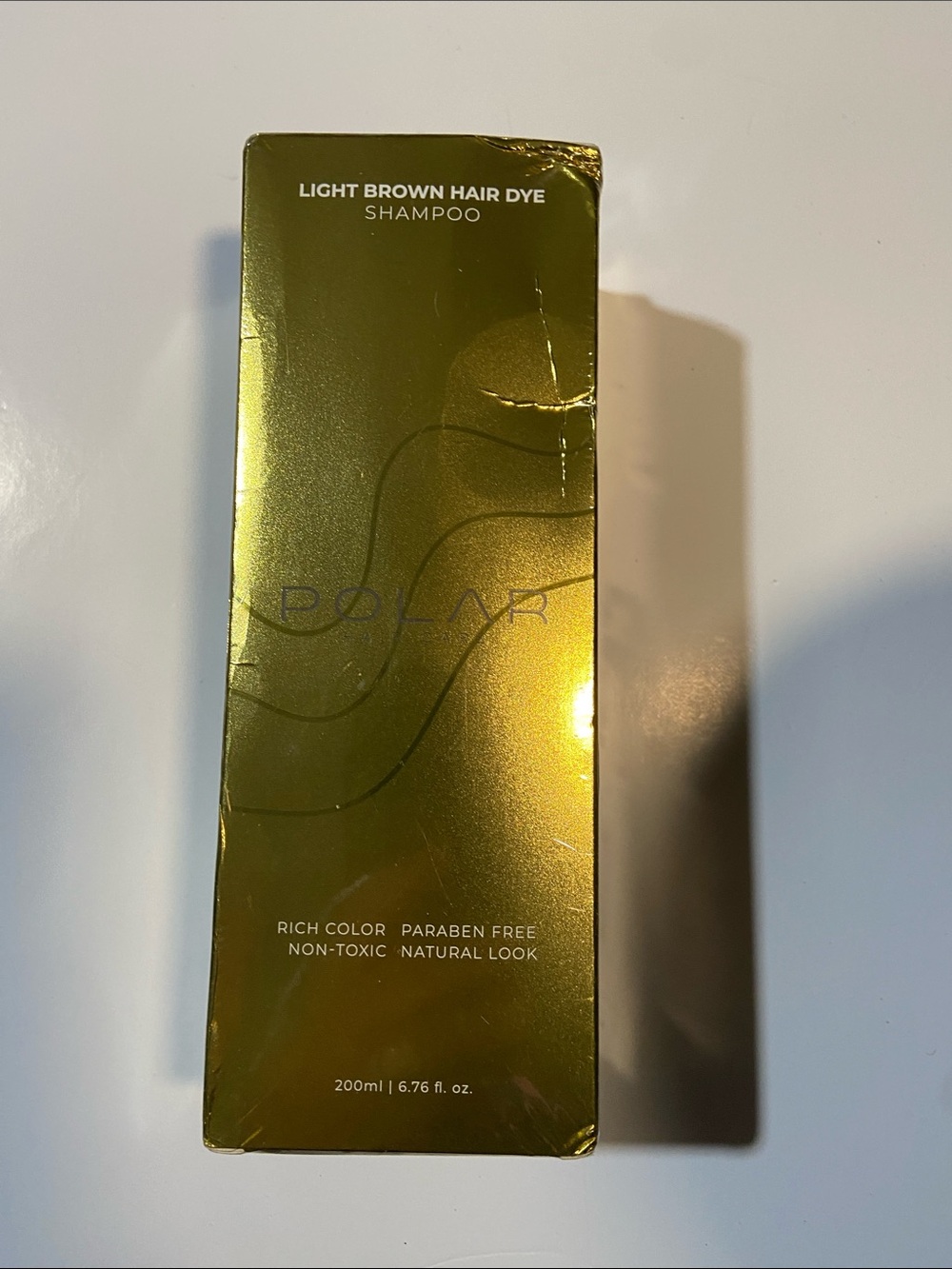 200 ml box of Polar Haircare Light Brown Hair Dye Shampoo